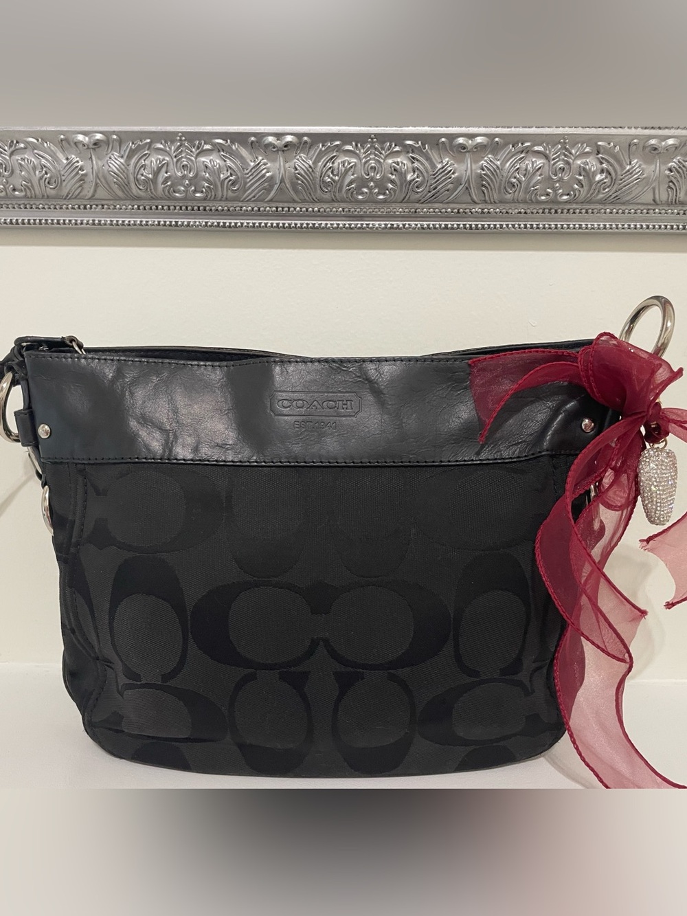 Coach Black Signature Canvas Shoulder Bag with Burgundy Ribbon
